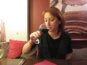 Sarah drinking red wine