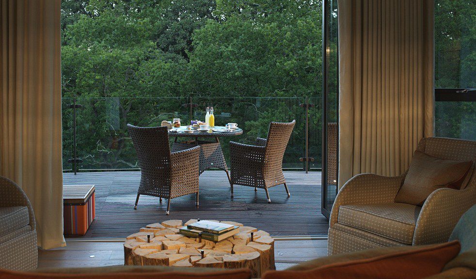 chewton glen treehouses with balcony furniture 