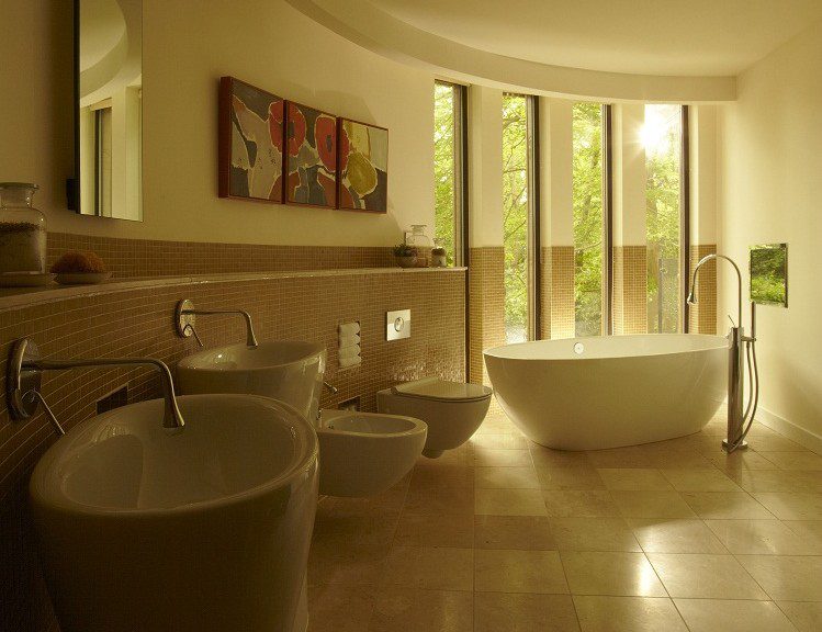 bathroom at chewton glen treehouse with bath and sinks