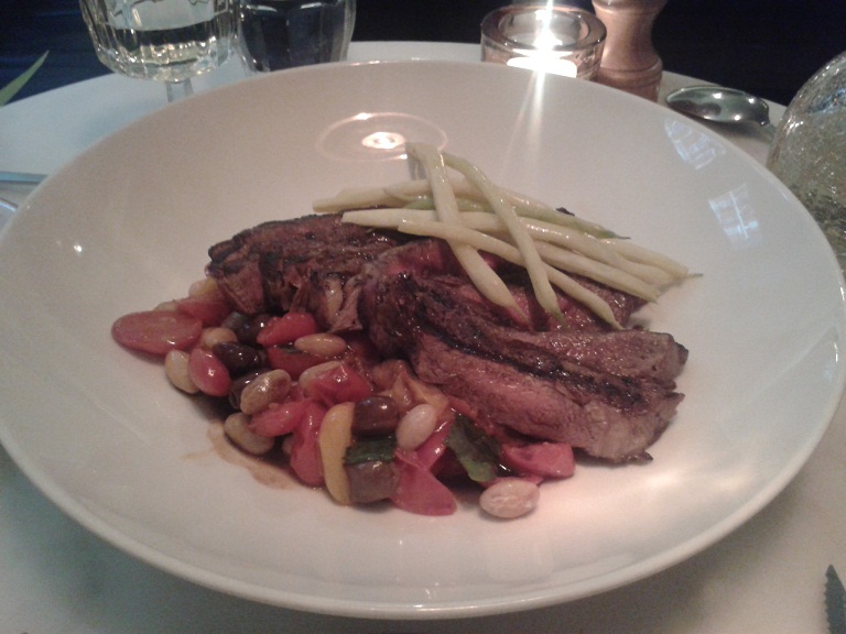 beef ribeye, with borlotti, tomato and olives