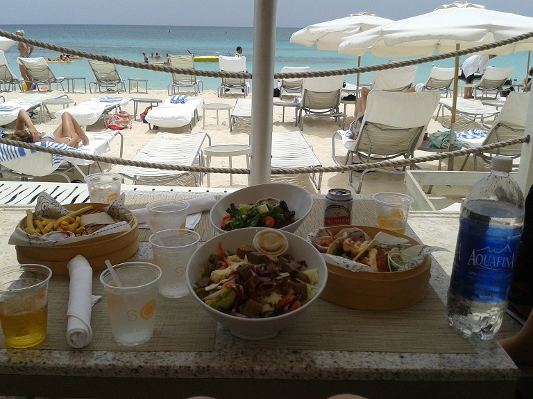 having lunch on the beach in the Cayman Islands