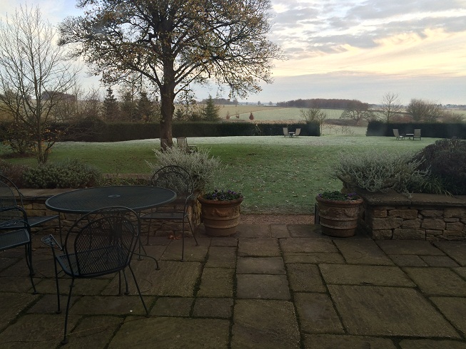 calcot manor courtyard and fields