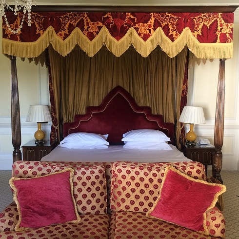 ornate four-poster bed at Danesfield House