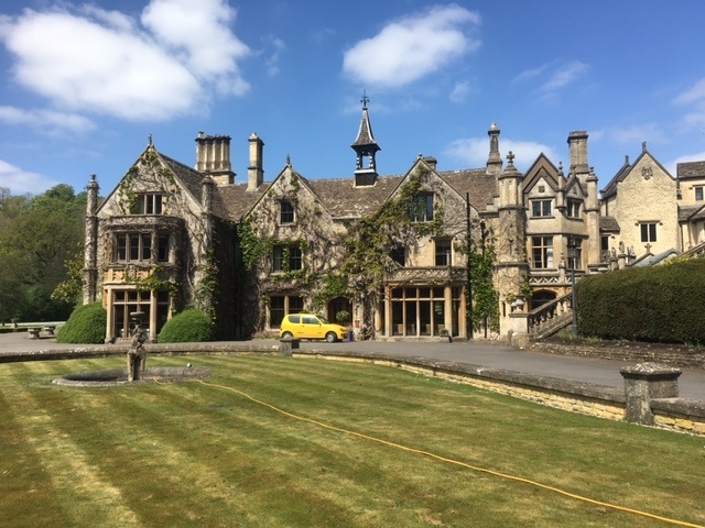 yellow fiat at the manor house castle combe