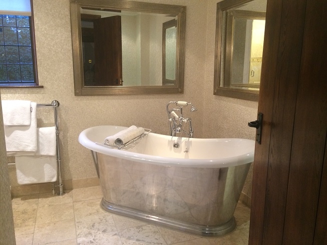 roll top bath in the Henry VIII suite at Langshott Manor