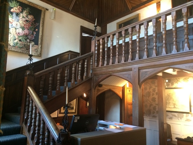 galleried reception area at Langshott Manor