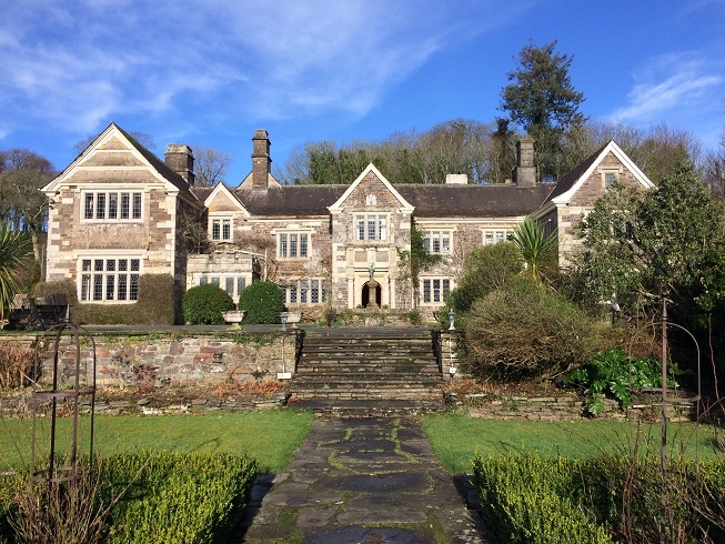 the front of Lewtrenchard Manor in the sunshine