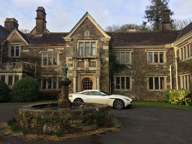 Aston Martin outside Lewtrenchard Manor hotel in Devon