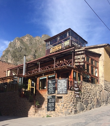 trekking the inca trail to machu picchu bar in Ollantaytambo