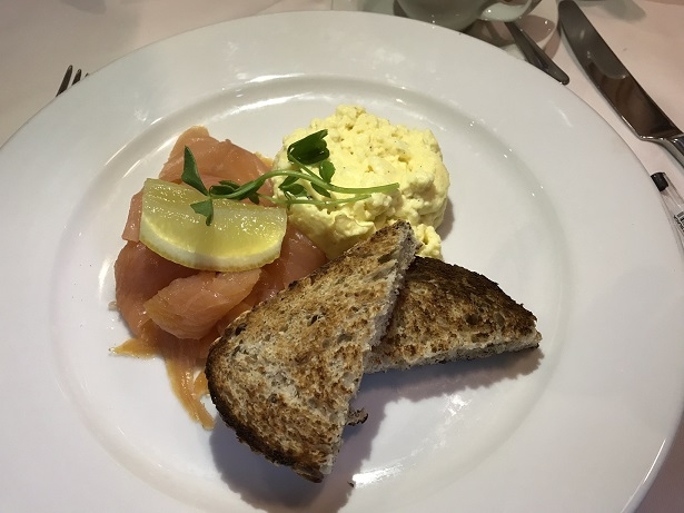 smoked salmon, scrambled eggs and wholemeal toast breakfast