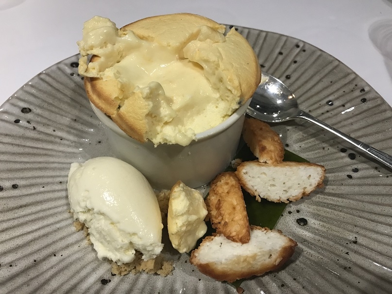 Passion fruit souffle with coconut ice-cream and coriander jelly at Le Talbooth