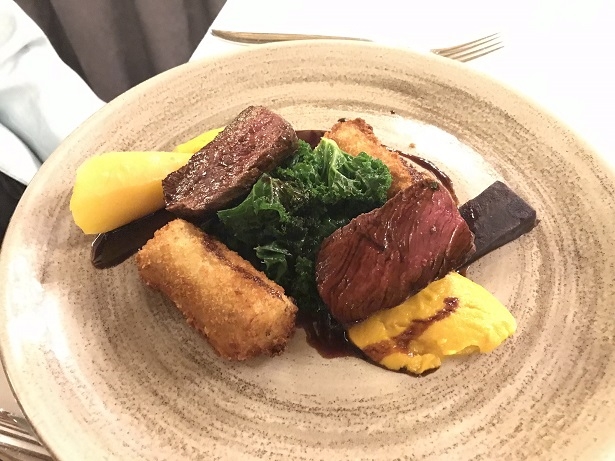 Roast venison, croquettes and kale