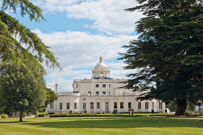 stay at Stoke Park luxury hotel view from tennis courts