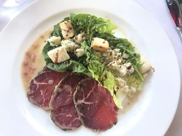 starter of beef carpaccio and stilton salad