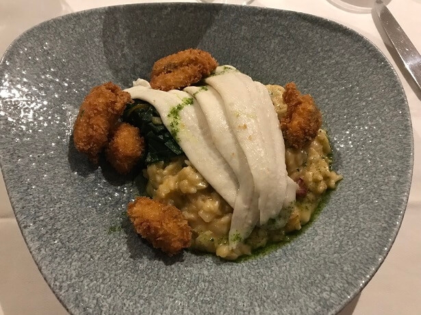 grilled plaice with crab risotto, crispy mussels and chard at Mullion Cove hotel Cornwall