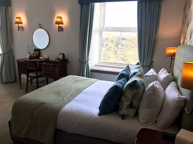 Bed with pillows at Mullion Cove hotel Cornwall