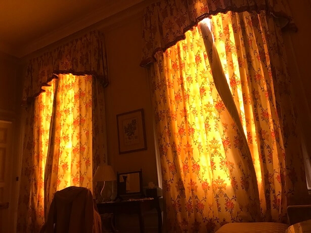 sun streaming through the curtains