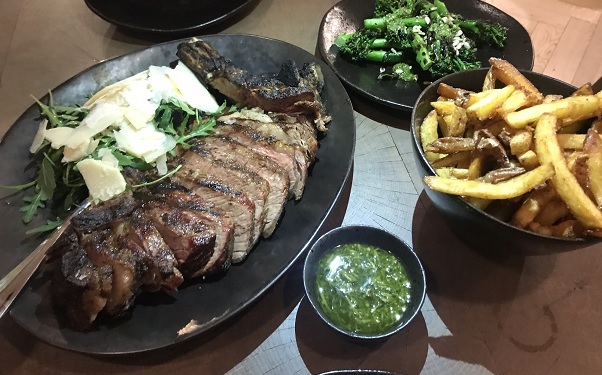 dinner at Botanica restaurant South Lodge hotel rib of beef with charred tenderstem broccoli, horseradish gremolata and rocket