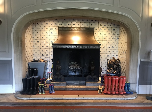 Lainston House hotel entrance hall with wellington boots