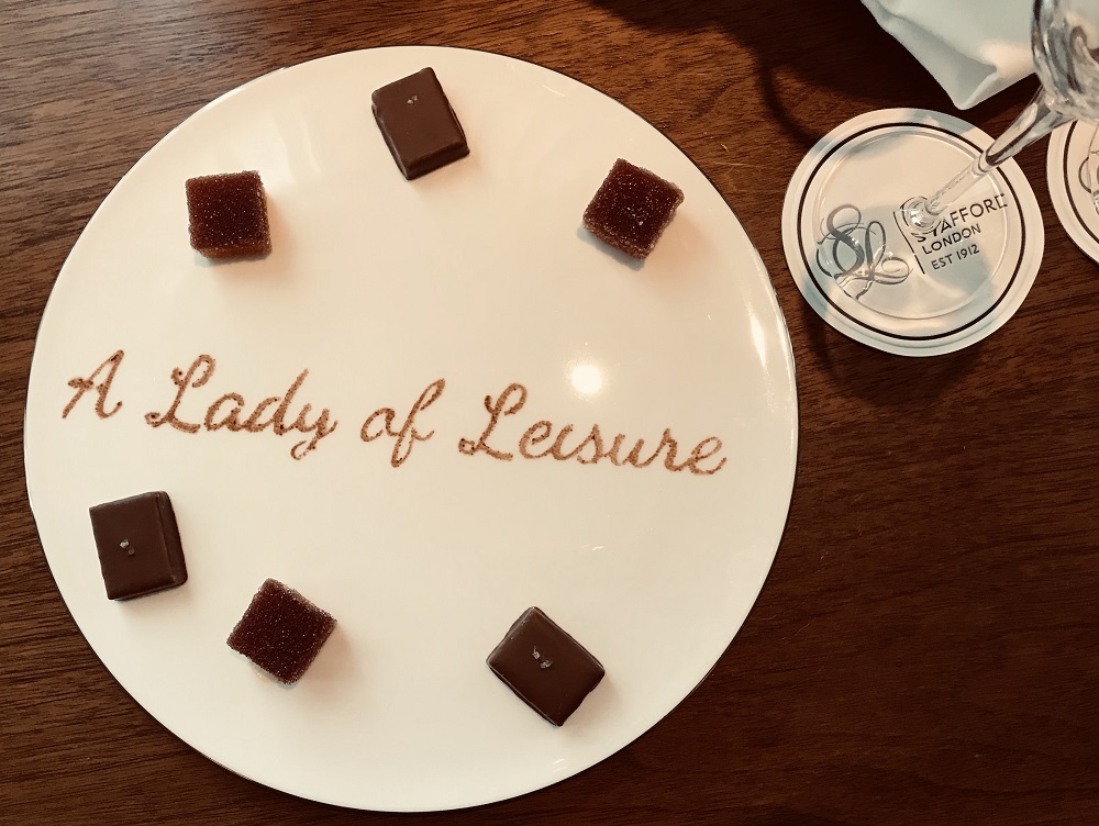 website name surrounded by petit fours