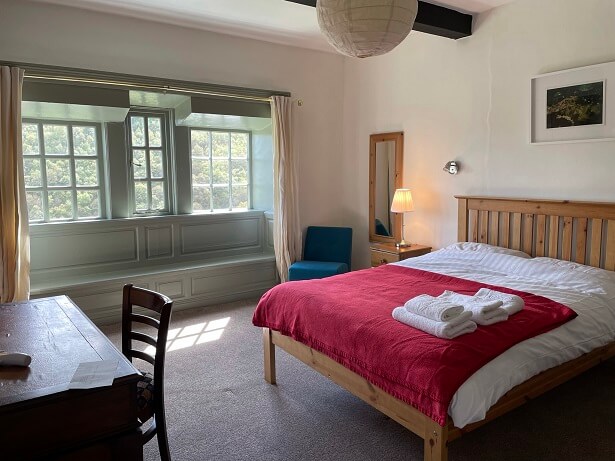 bedroom at Lumb Bank