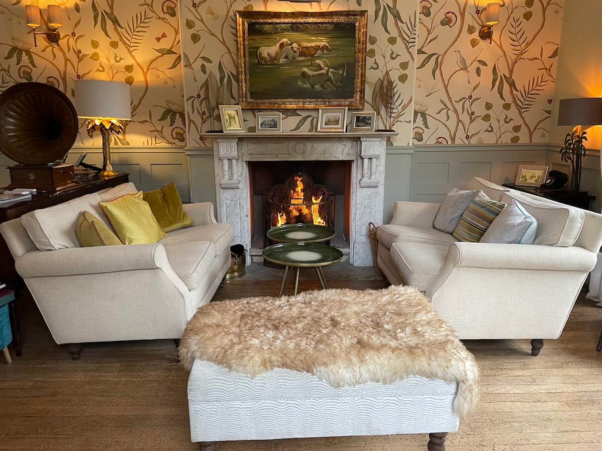 lounge with open fire at Burleigh Court hotel