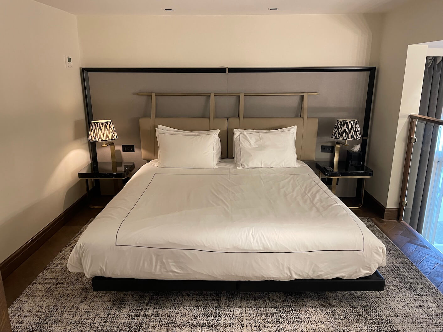 the King-sized bed in the Loft bedroom at Holmes Hotel London