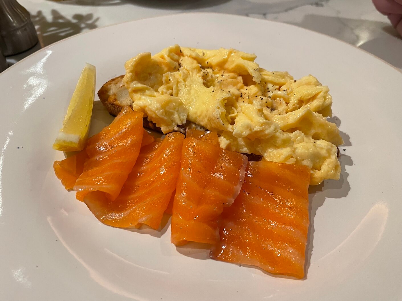 scrambled eggs and smoked salmon at Holmes hotel London