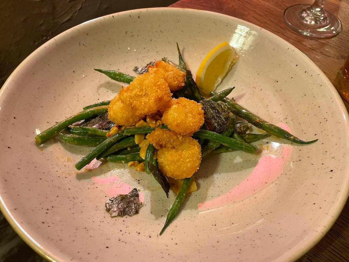 Coconut tiger prawns with green bean and peanut salad, pickled ginger and crispy seaweed at the Kings Head Bledington