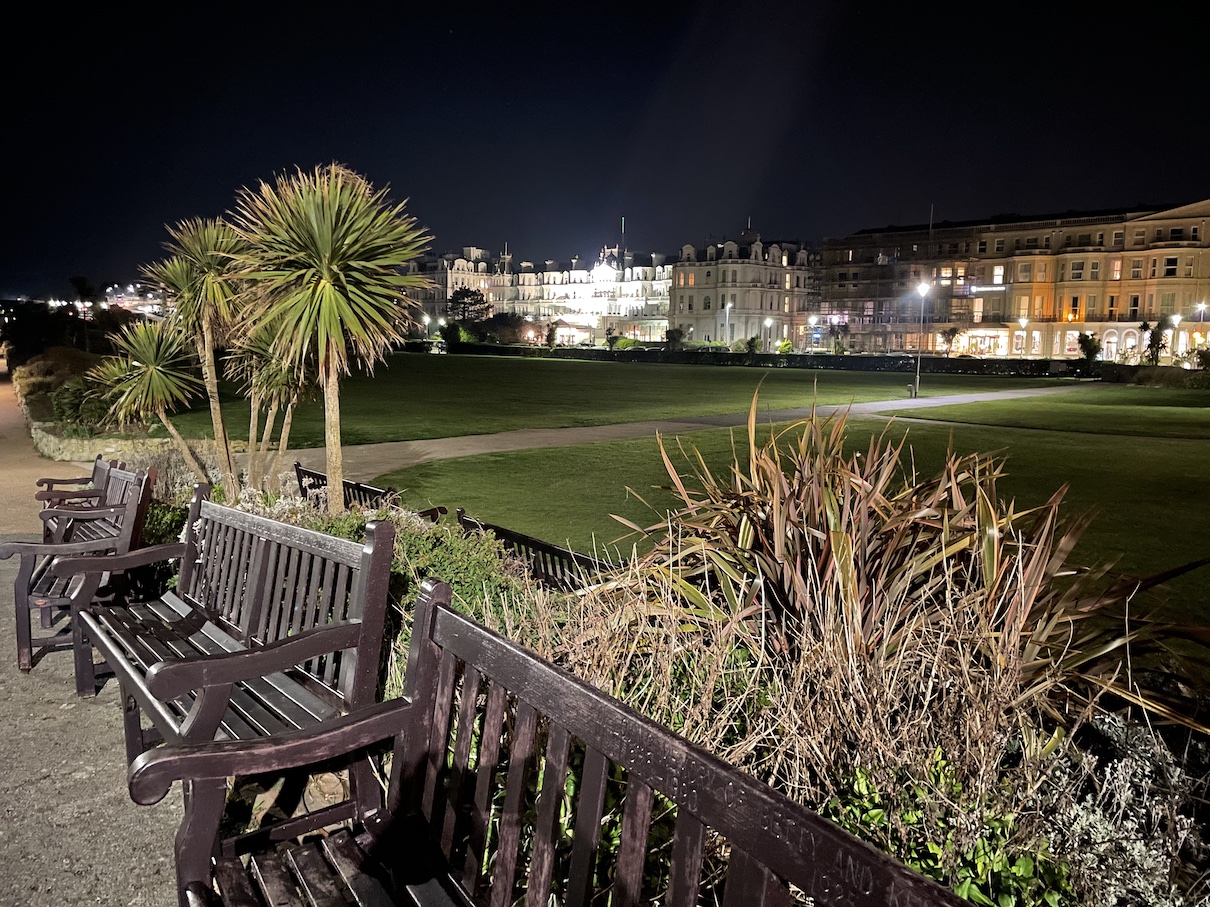 The view of The Grand Hotel at night from the coastal path 