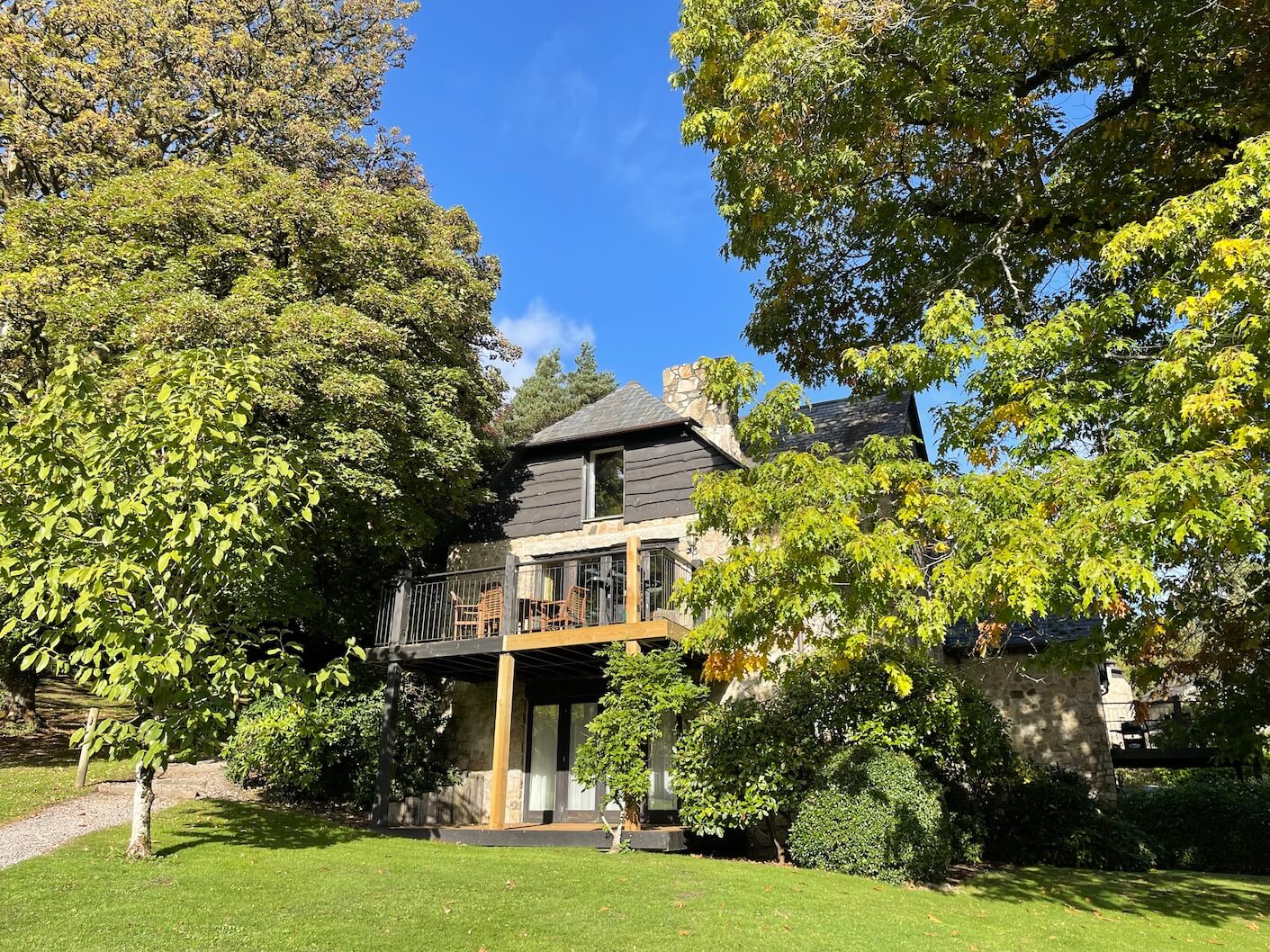 Bovey Castle lodges in the sunshine