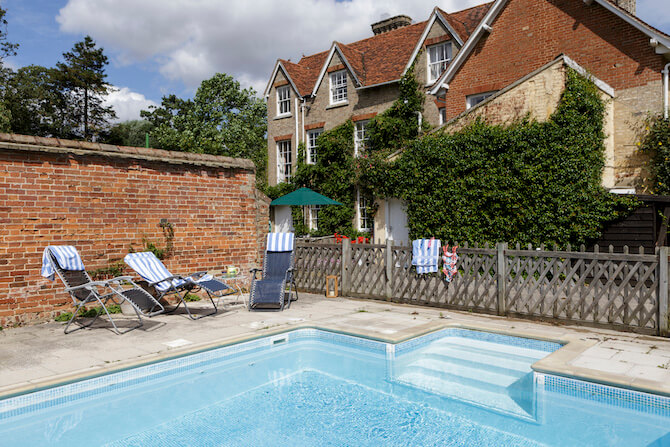 outdoor swimming pool at the rectory manor hotel Suffolk