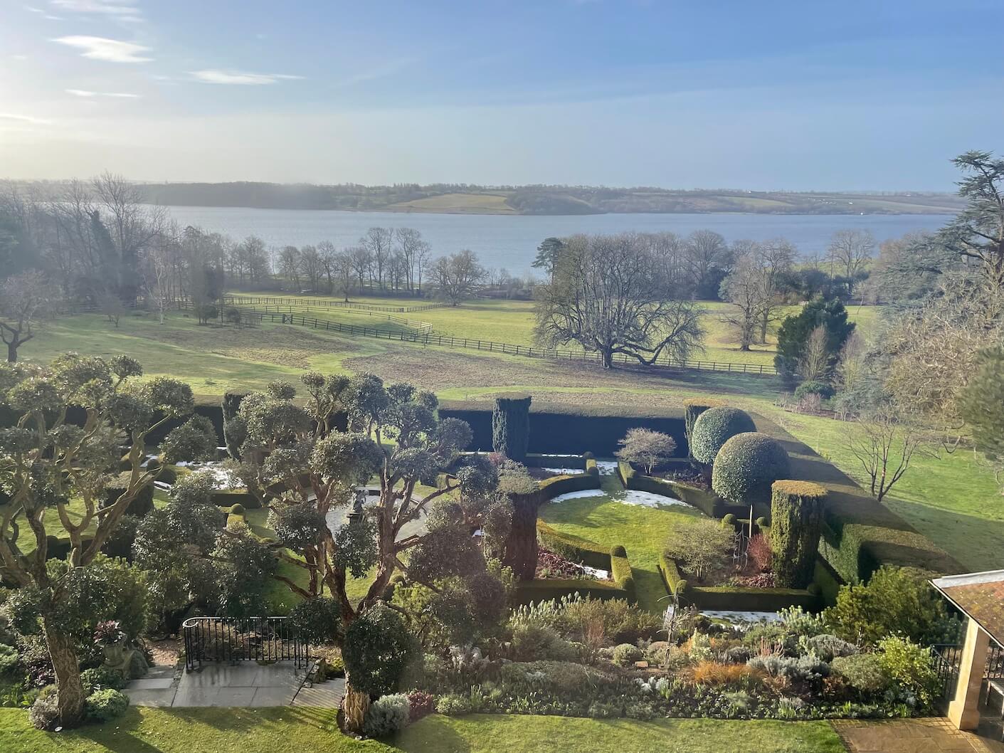 views of Rutland Water from the gardens at Hambleton Hall hotel