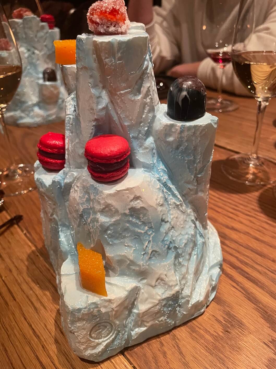 The petits fours were served on a blue iceberg