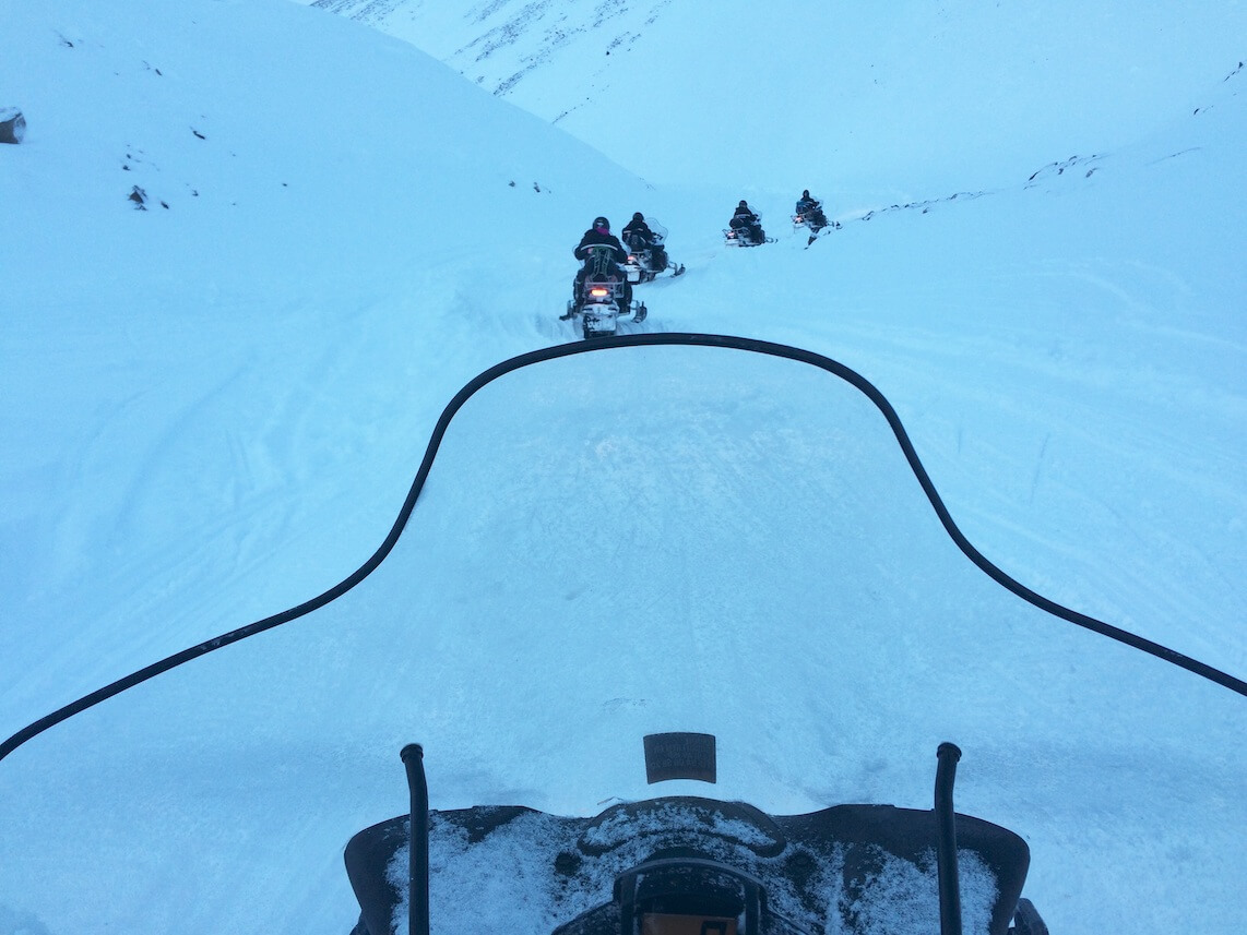 snowmobiles over the snow