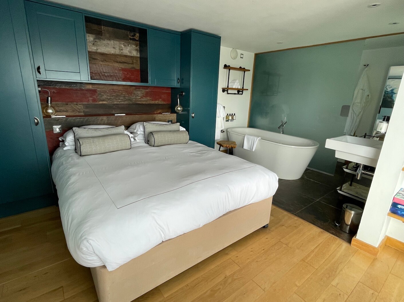 The romantic open-plan bedroom at Agatha's Beach House at Burgh Island