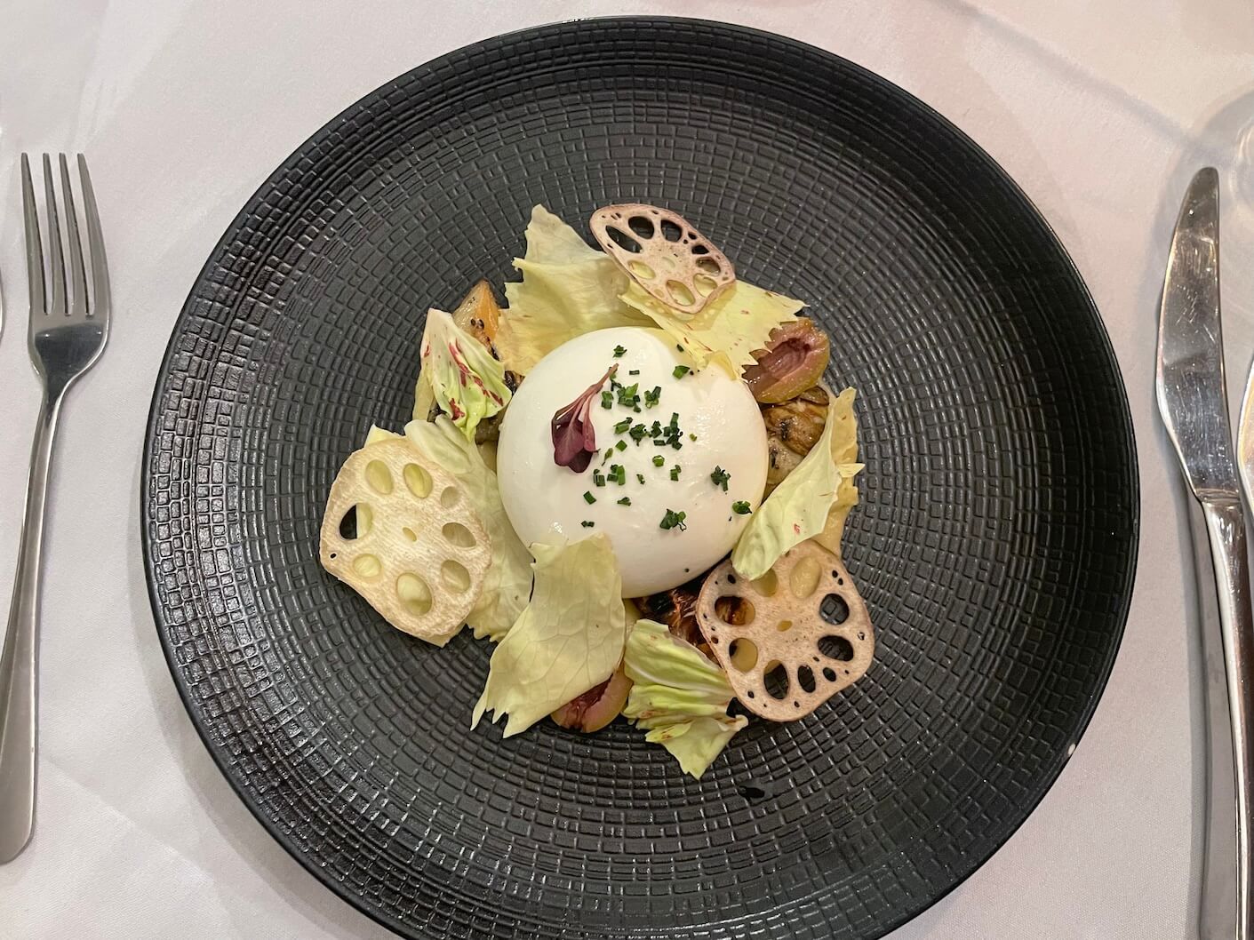 starter of Burrata winter salad with grilled artichoke, celeriac and radicchio