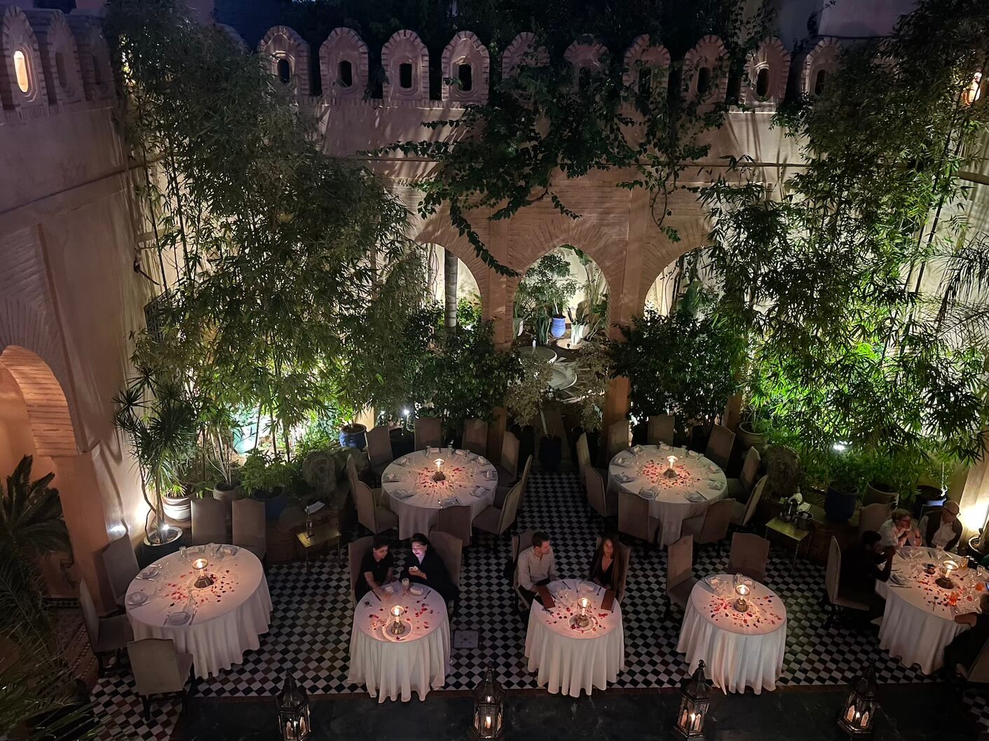 Diners enjoying the opulent surroundings of Dar Acout