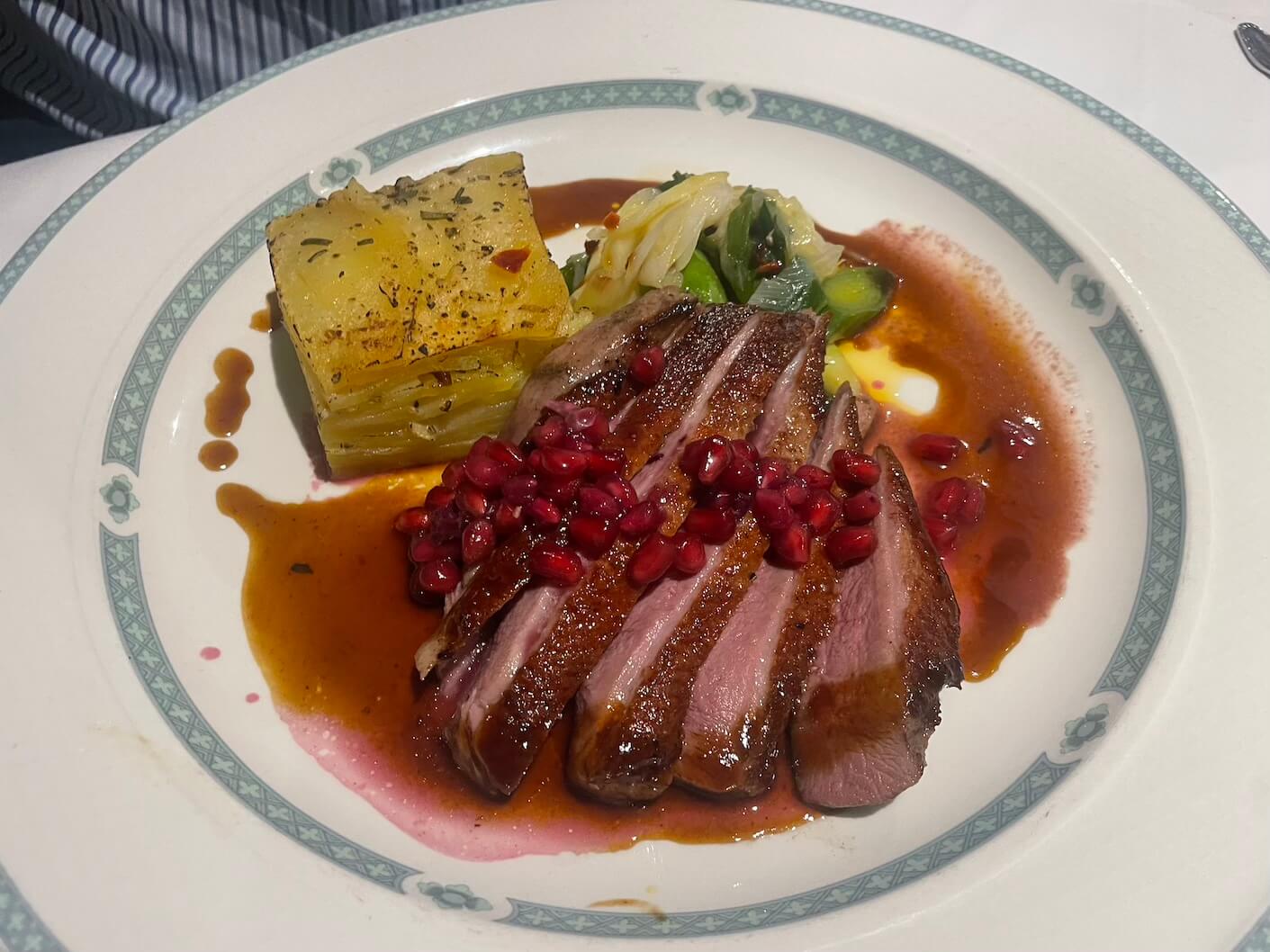 duck breast with dauphinoise potatoes and pomegranate dressing