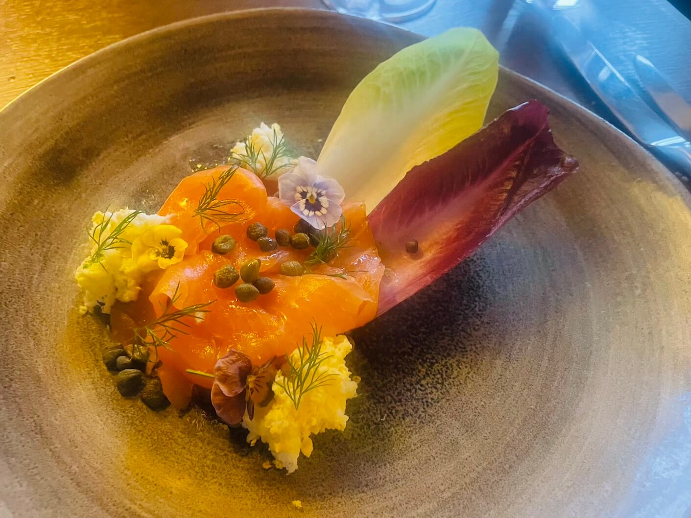 Silent Pool-gin-infused smoked salmon with capers, dill, egg pollen and chicory Silent Pool-gin-infused smoked salmon with capers, dill, egg pollen and chicory